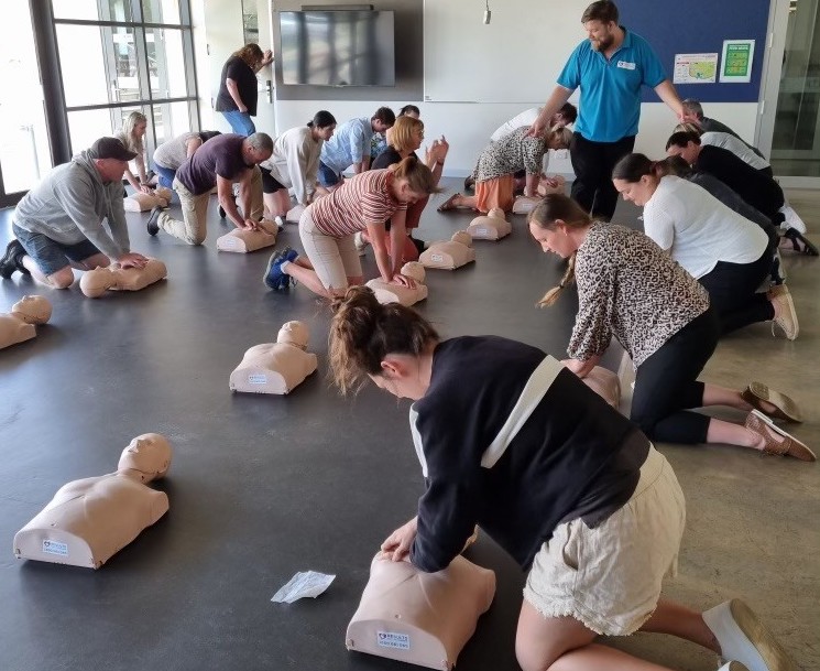 Instructor demonstrating practical first aid training